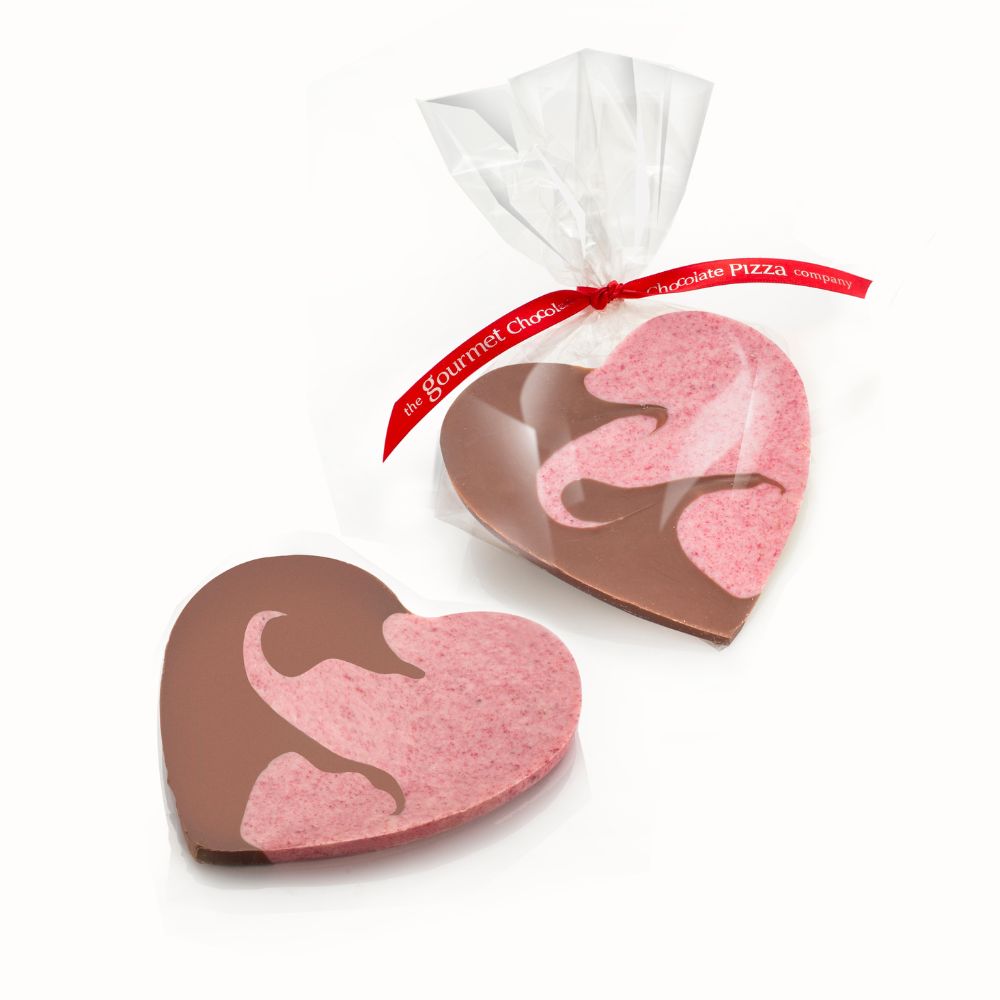 Chocolate hearts with milk chocolate and raspberry white chocolate.